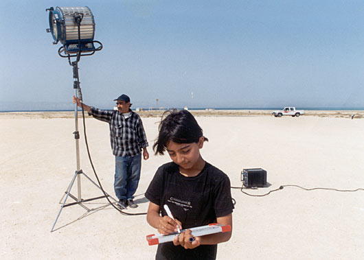 On the set of her father's film " The Door " as Script Supervisor at the age of 8